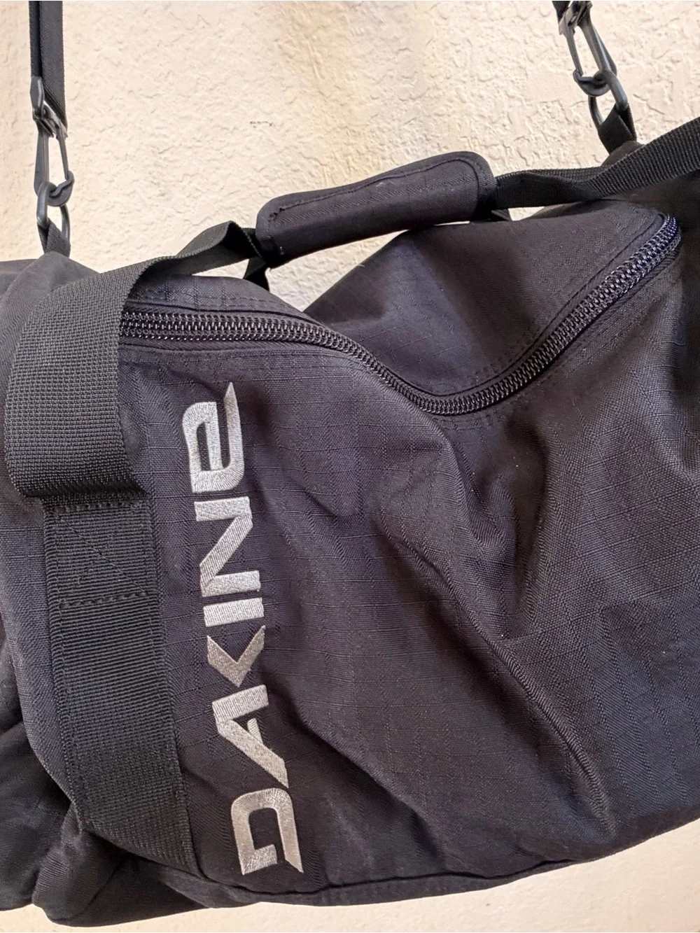 DAKINE Black Men’s Duffel with White Logo